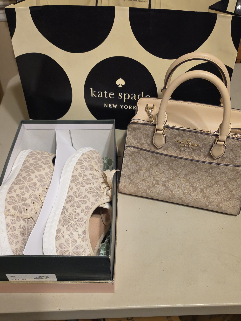 kate spade beige floral logo satchel with matching cream sneakers